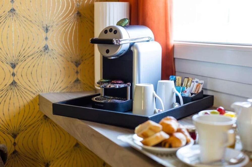 Foto de una habitación de Hotel Paris Neuilly
