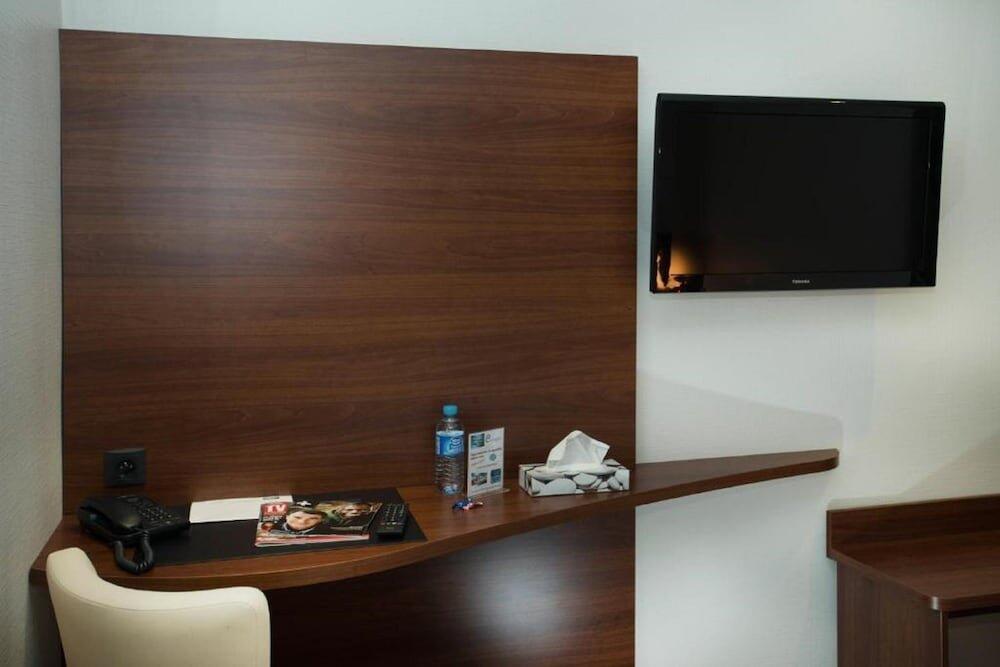 Foto de una habitación de Brit Hotel Tours Sud – Le Cheops