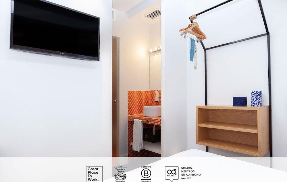 Foto de una habitación de Hostal SLEEP&amp;#039;N Atocha - B Corp Certified