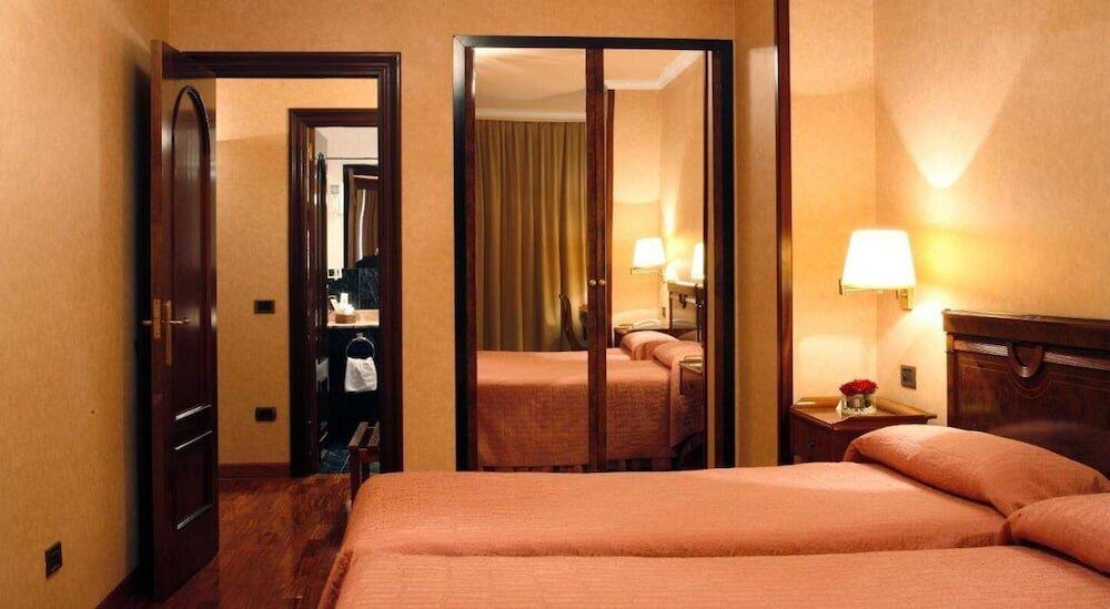 Foto de una habitación de Hotel Alcomar