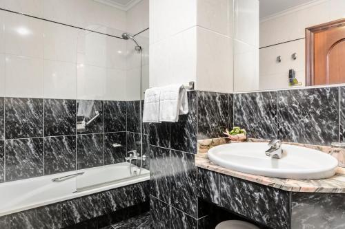 Foto del baño de Hotel Alcomar
