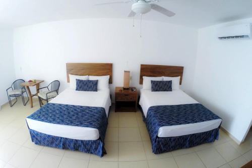 Foto de una habitación de Costa Alegre Hotel &amp;amp; Suites