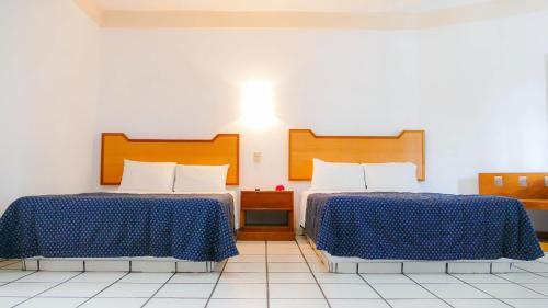 Foto de una habitación de Costa Alegre Hotel &amp;amp; Suites