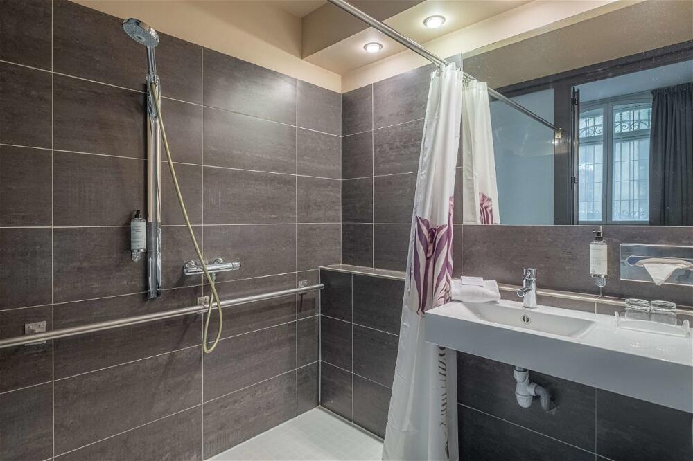 Foto del baño de Best Western Grand Hotel Francais