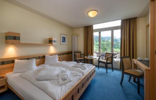 Foto de una habitación de Hotel Arenas Resort Victoria-Lauberhorn
