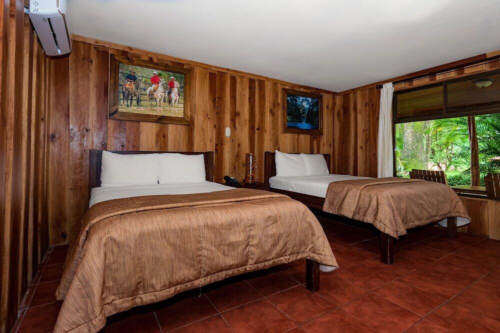 Foto de una habitación de Hotel Hacienda Guachipelin