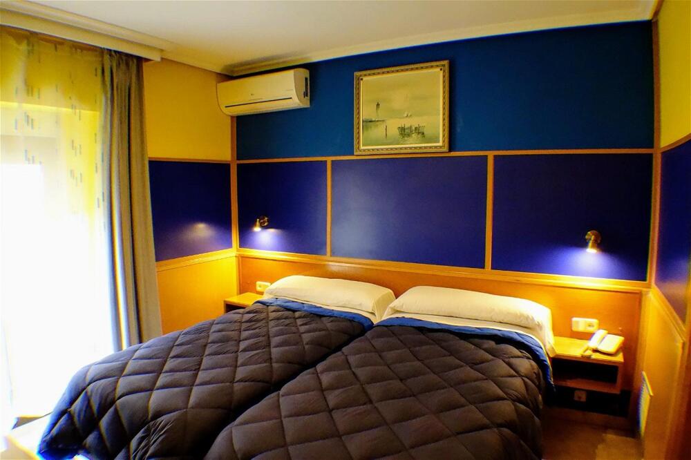 Foto de una habitación de Trípolis Toledo