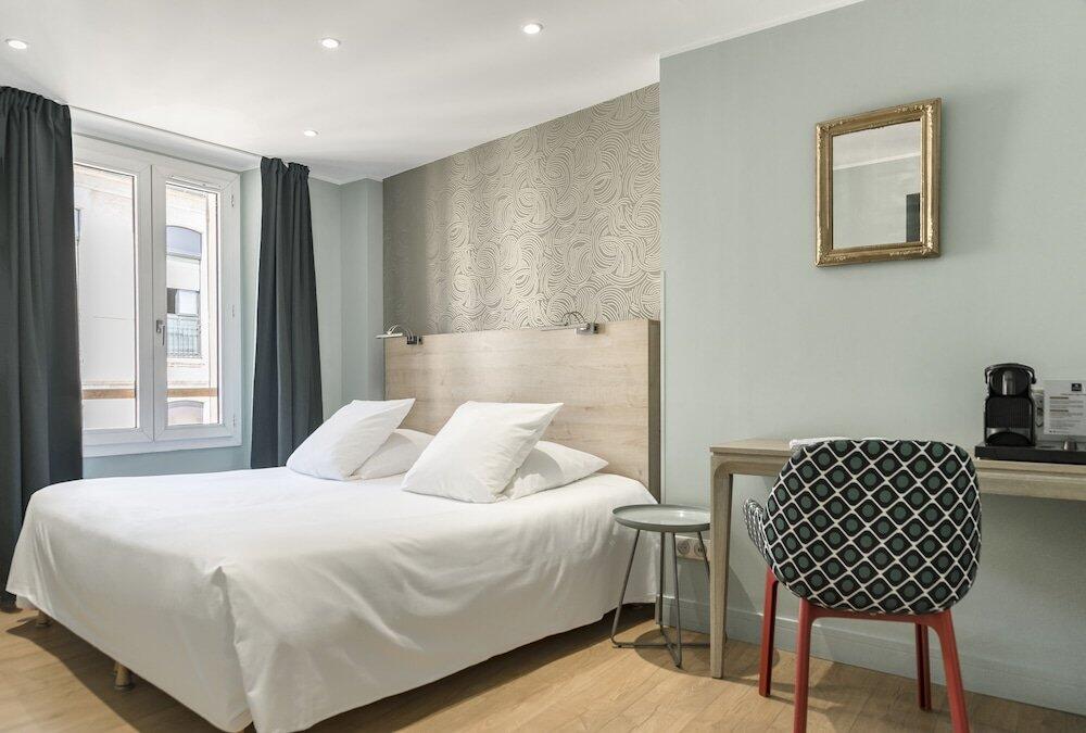 Foto de una habitación de Grand Hôtel Dauphiné, Boutique Hôtel &amp;amp; Suites