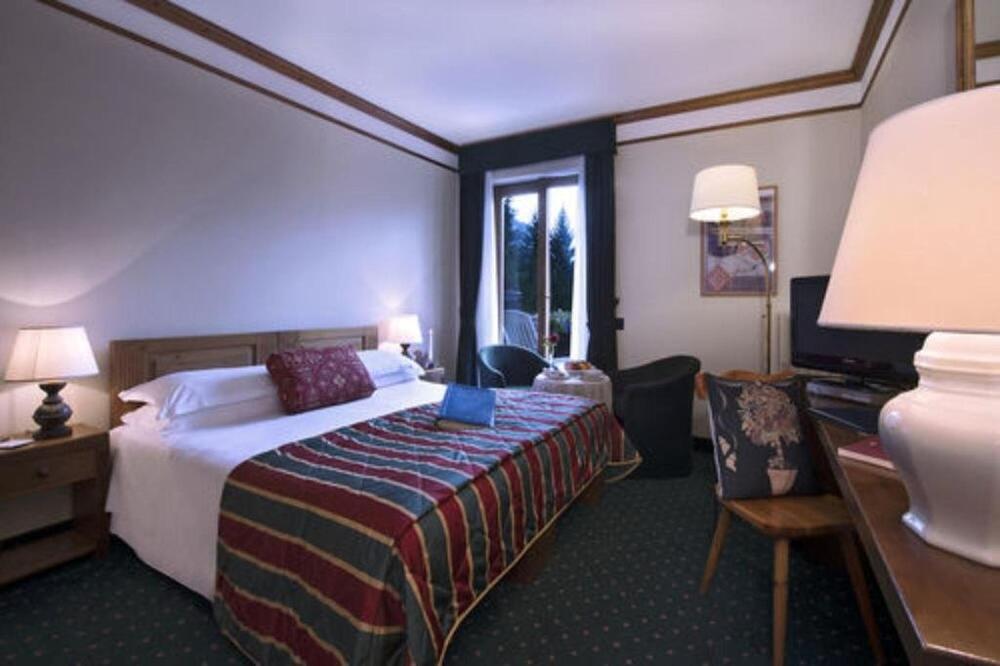 Foto de una habitación de Boutique Hotel Villa Blu Cortina D&amp;#039;Ampezzo