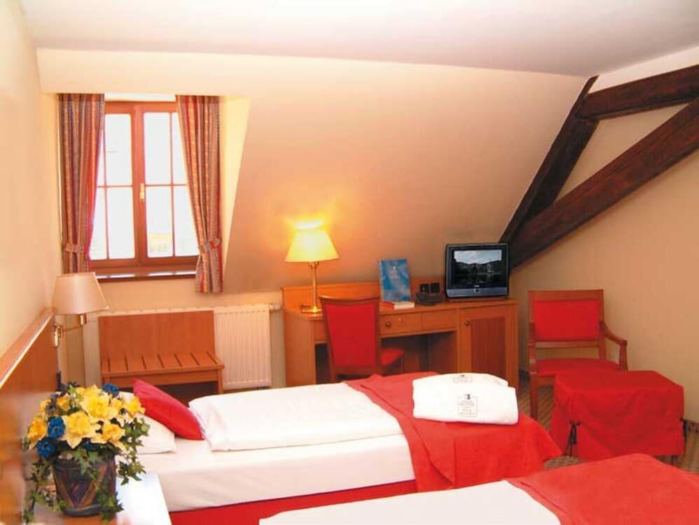 Foto de una habitación de Romantik Hotel Tuchmacher
