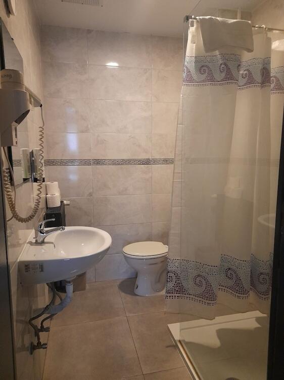 Foto de una habitación de Hotel Albergo