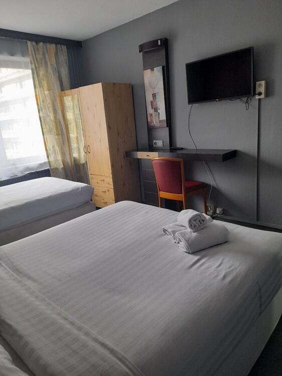 Foto de una habitación de Hotel Albergo