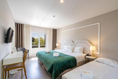 Foto de una habitación de Imperhotel
