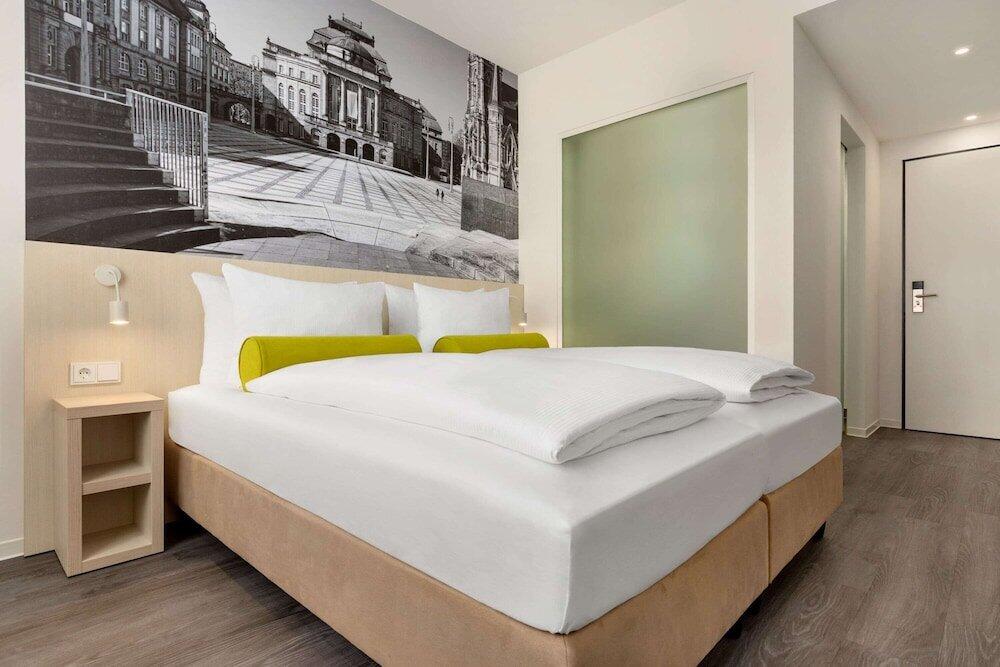 Foto de una habitación de Hotel Super 8 by Wyndham Chemnitz