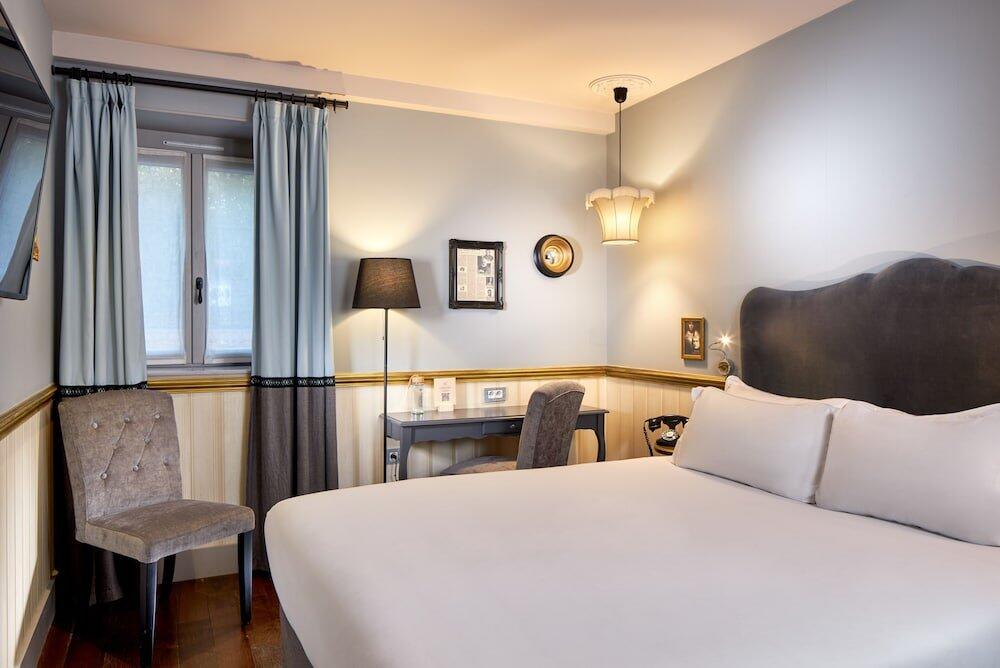 Foto de una habitación de Les Plumes Hotel