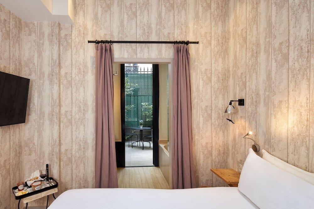 Foto de una habitación de Les Plumes Hotel
