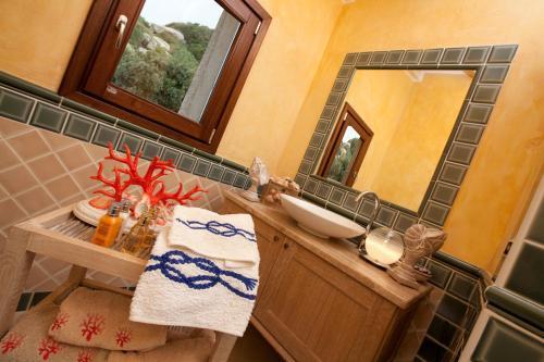 Foto del baño de Aparthotel Punta Falcone Resort