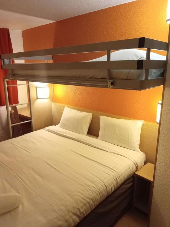 Foto de una habitación de Hotel Premiere Classe Saint Brice Sous Forêt