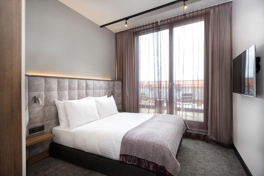 Foto de una habitación de Adina Apartment Hotel Nuremberg