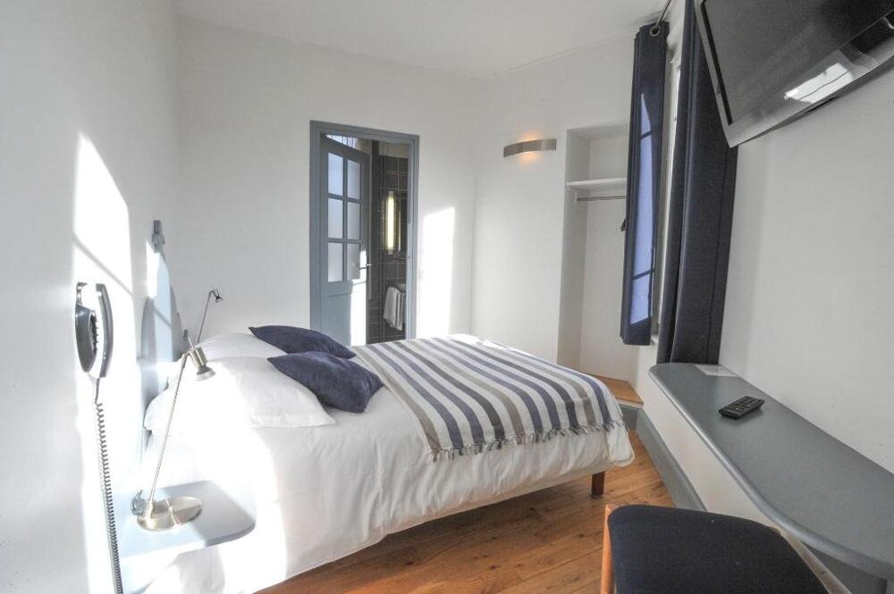 Foto de una habitación de Hôtel des Falaises