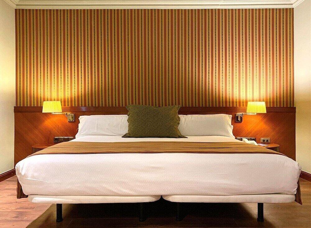 Foto de una habitación de Hotel Torremangana