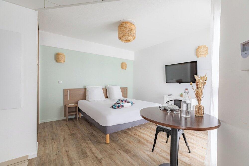 Foto de una habitación de Appart&amp;#039;City Confort Pau Centre