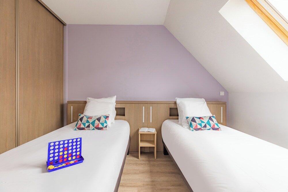 Foto de una habitación de Appart&amp;#039;City Confort Pau Centre