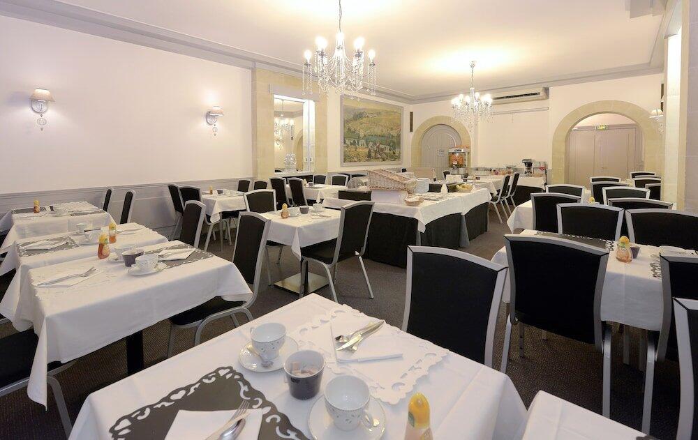 Foto de restauración de Hôtel De France