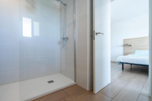Foto de una habitación de Apartaments La Perla Negra