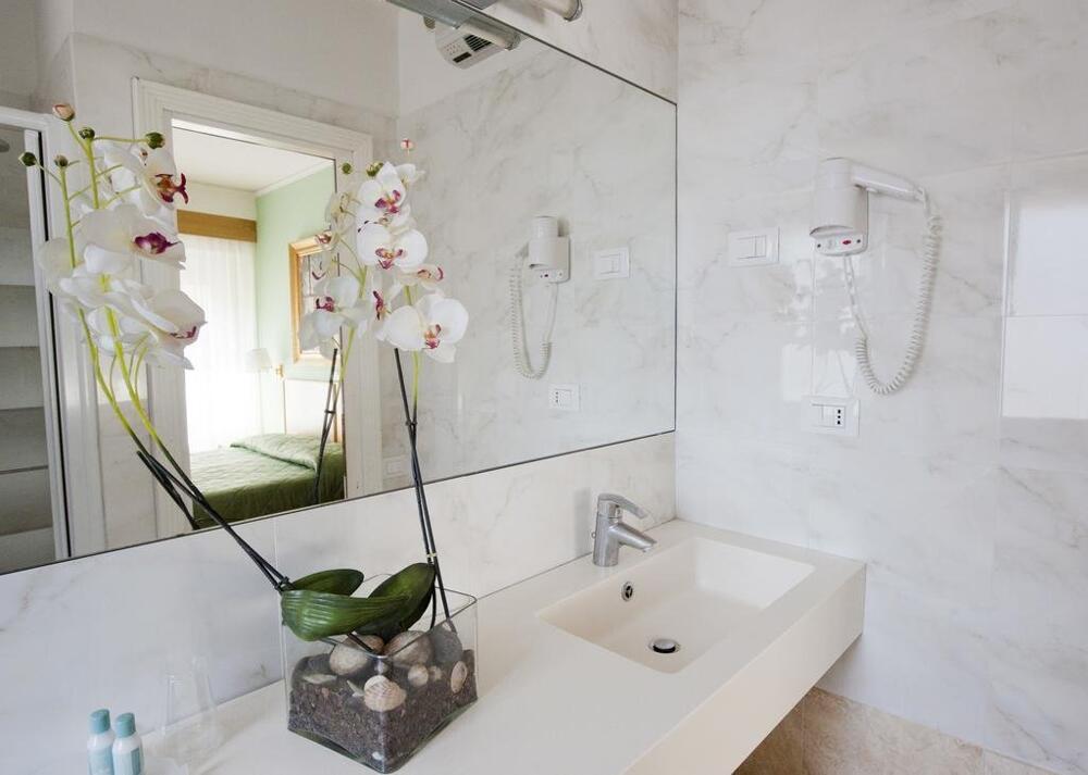 Foto del baño de Hotel Touring