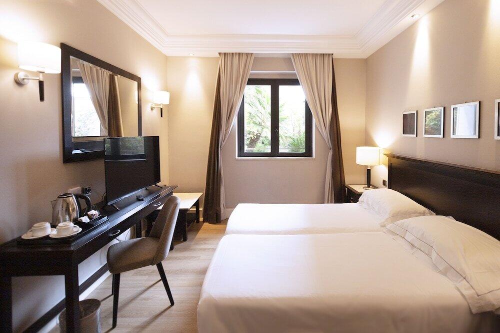 Foto de una habitación de Hotel Regina Margherita