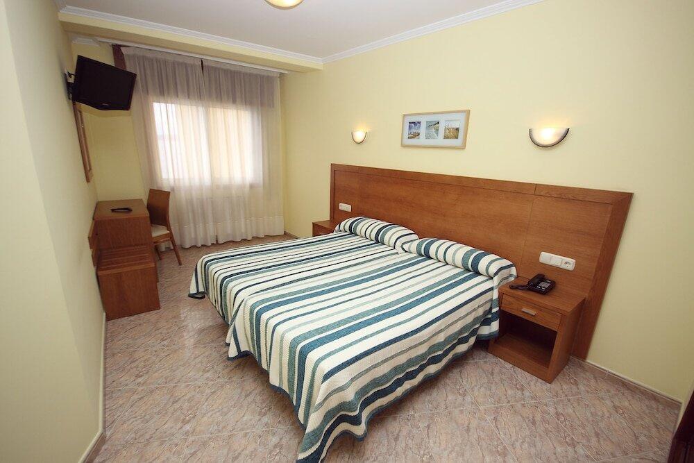 Foto de una habitación de Hotel El Puente