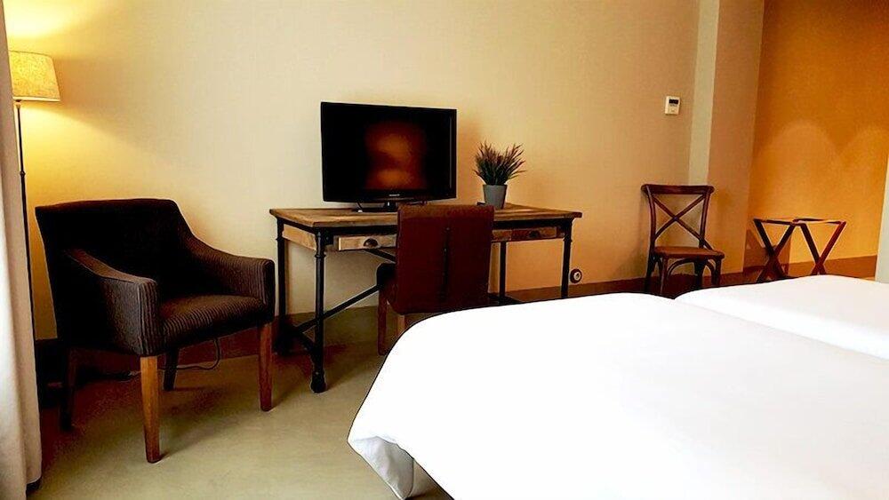 Foto de una habitación de Hotel Palacio Carvajal Girón