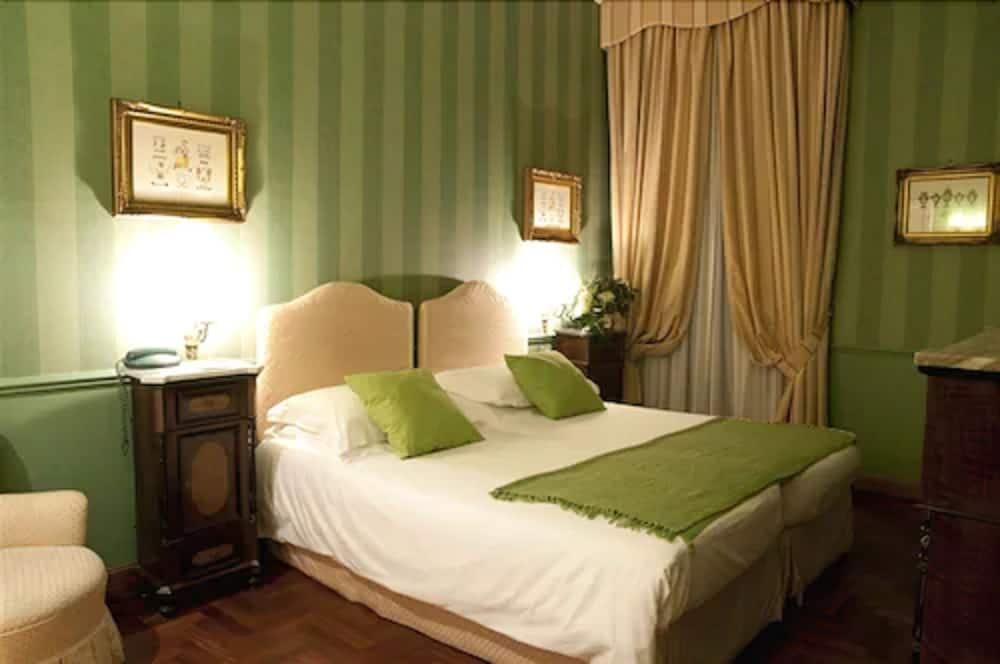 Foto de una habitación de Hotel Villa del Bosco