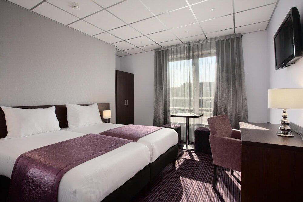 Foto de una habitación de Hotel Luxer