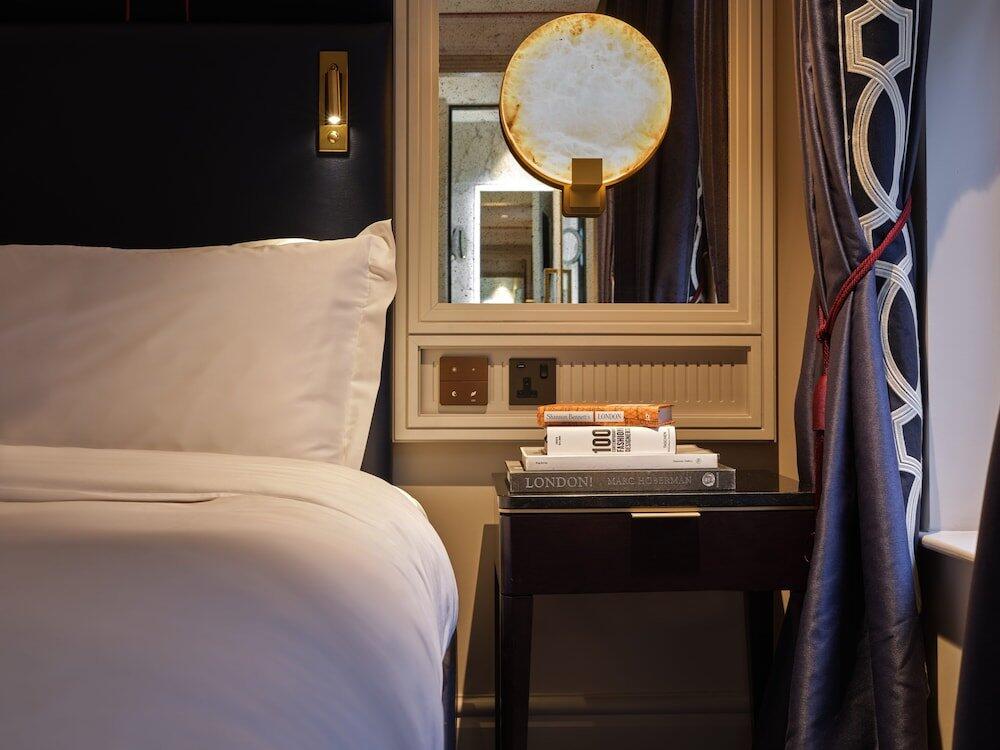 Foto de una habitación de The Mayfair Townhouse - an Iconic Luxury Hotel