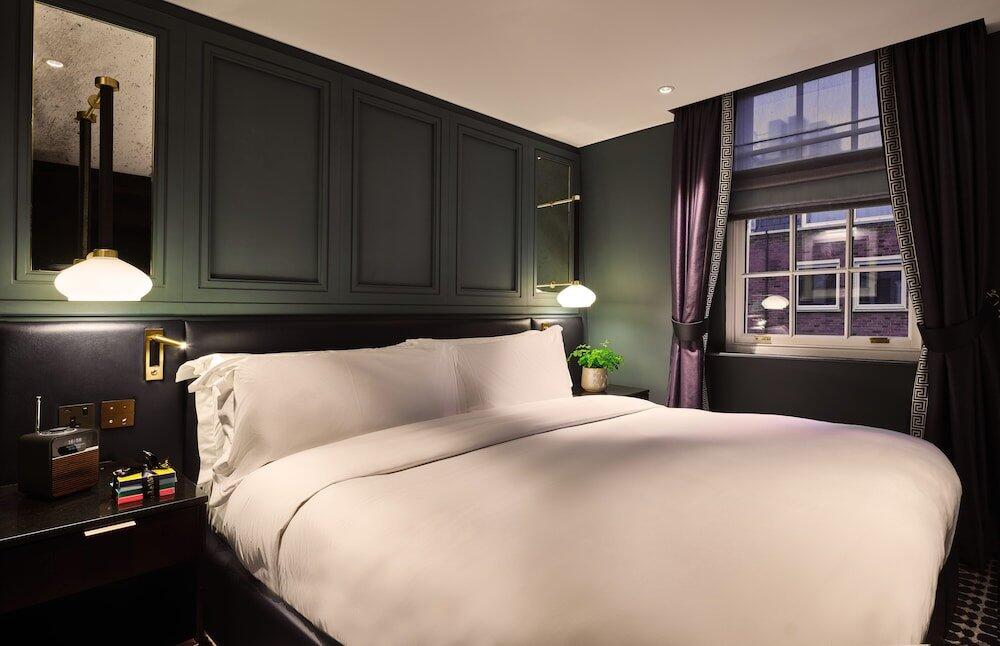 Foto de una habitación de The Mayfair Townhouse - an Iconic Luxury Hotel