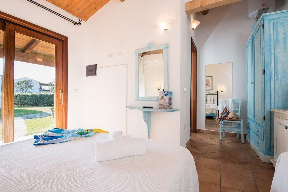 Foto de una habitación de TH San Teodoro - Liscia Eldi Village