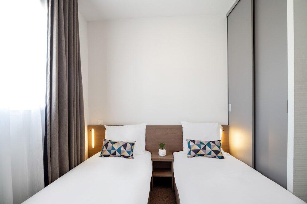 Foto de una habitación de Appart&amp;#039;City Confort Niort Centre
