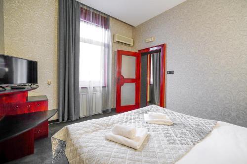 Foto de una habitación de Hotel Central Club Sofia