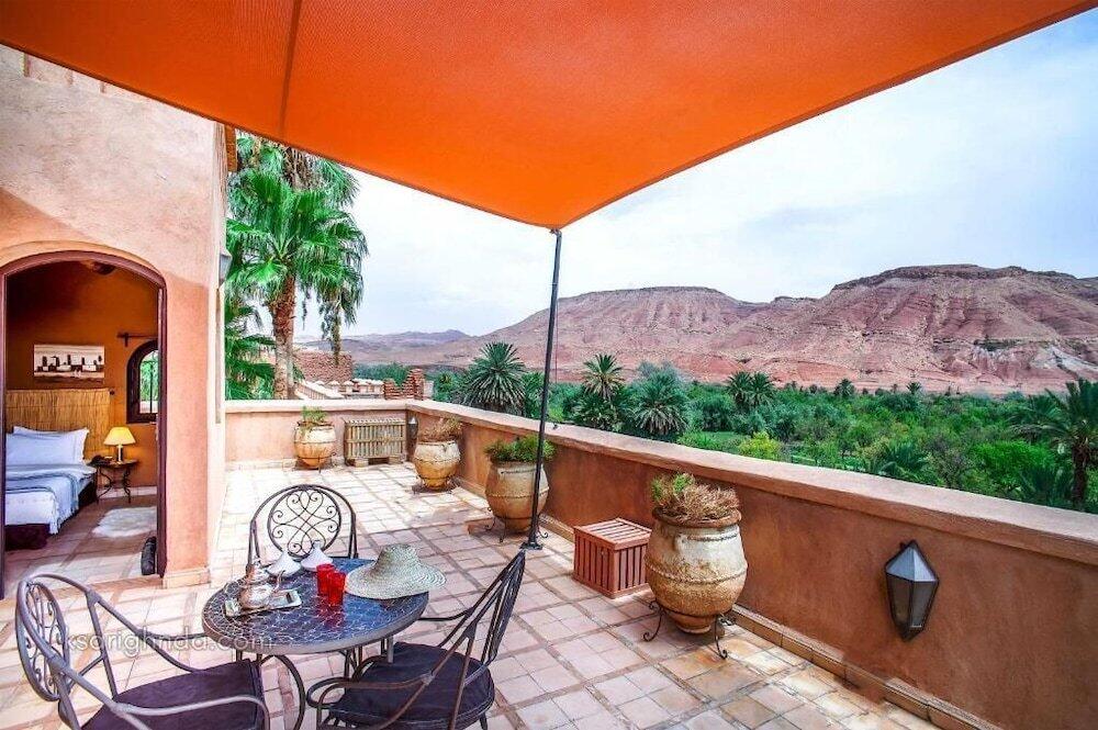 Foto de una habitación de Riad Ksar Ighnda