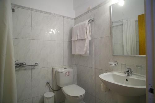 Foto del baño de Athos Hotel