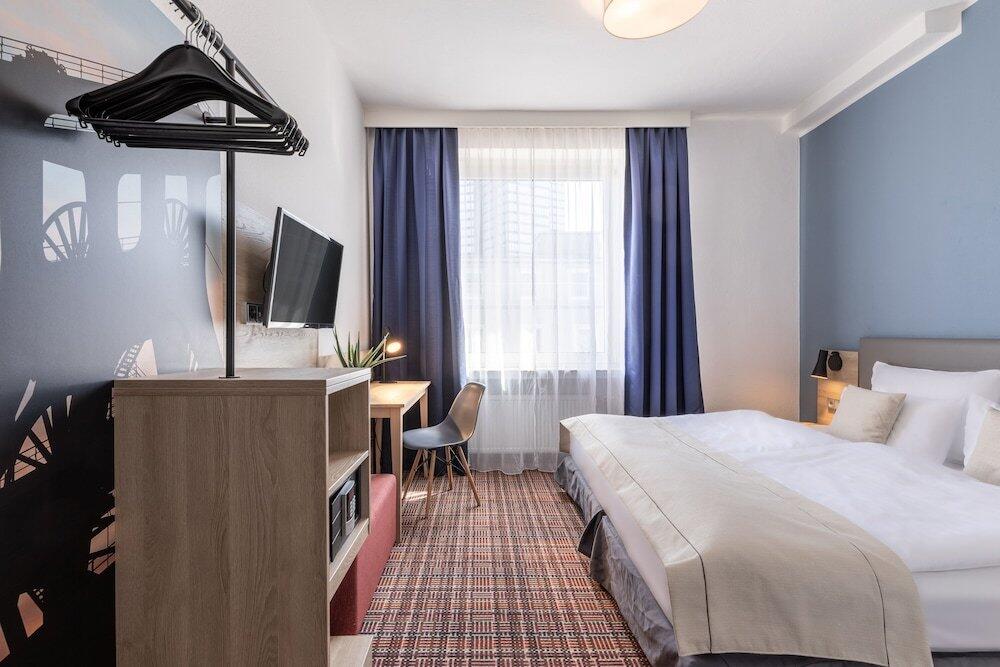 Foto de una habitación de Novum Hotel Ambassador