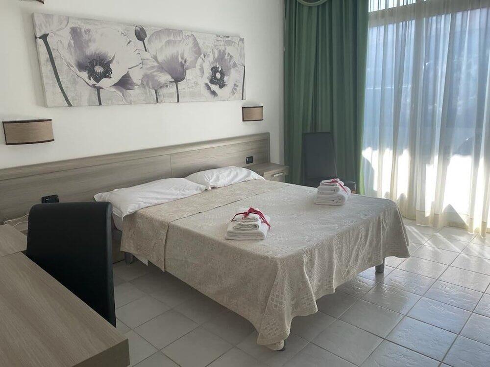 Foto de una habitación de Hotel Degli Haethey