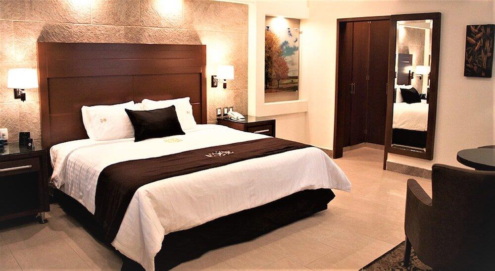 Foto de una habitación de Hotel Ecce Inn &amp;amp; Spa