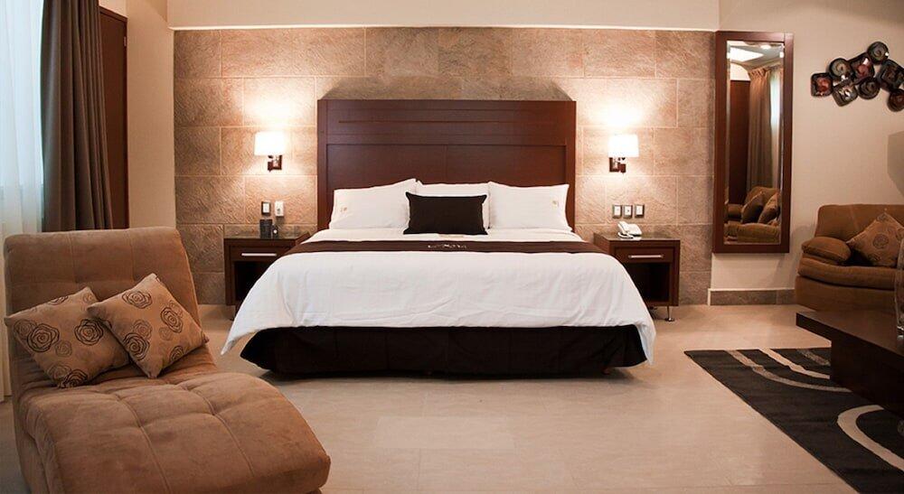 Foto de una habitación de Hotel Ecce Inn &amp;amp; Spa