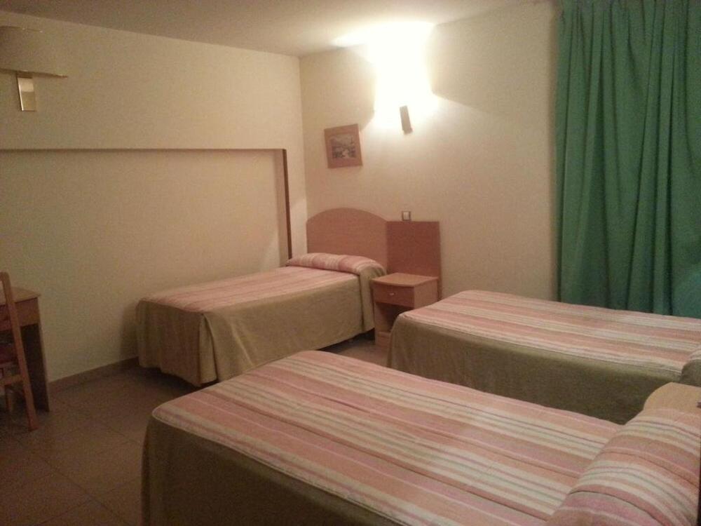Foto de una habitación de Hostal El Arco