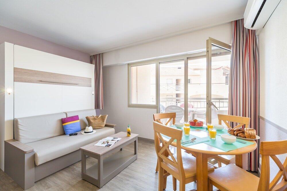 Foto de una habitación de Résidence Pierre &amp;amp; Vacances Les Platanes