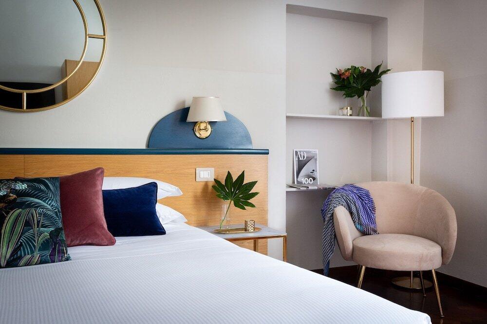 Foto de una habitación de Aramis Rooms
