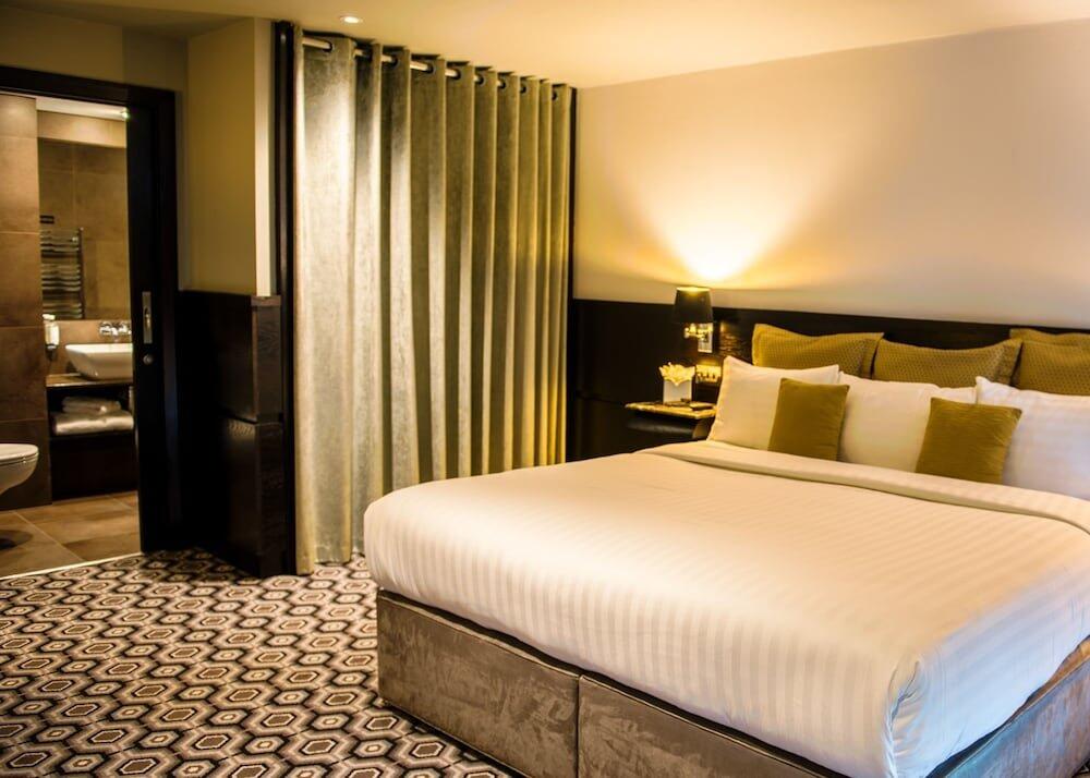 Foto de una habitación de The Vincent Hotel